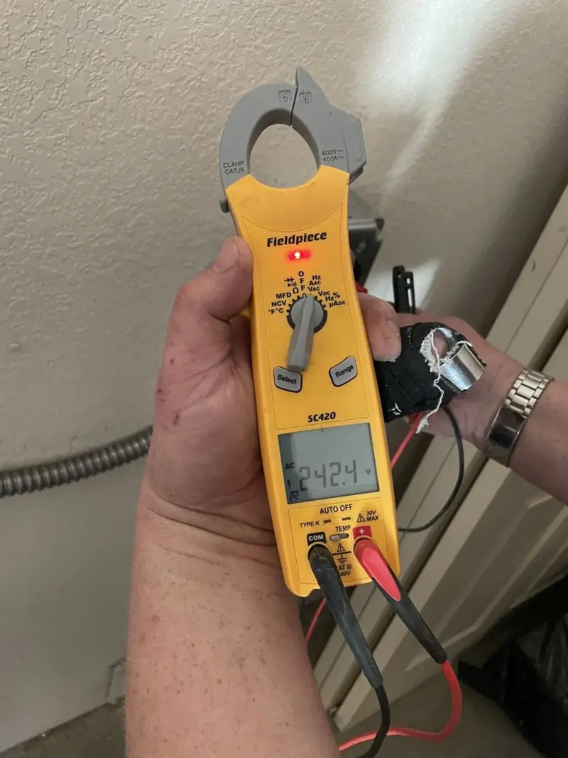 Voltage testing with clamp meter during Ceiling Fan Installation in Deer Park